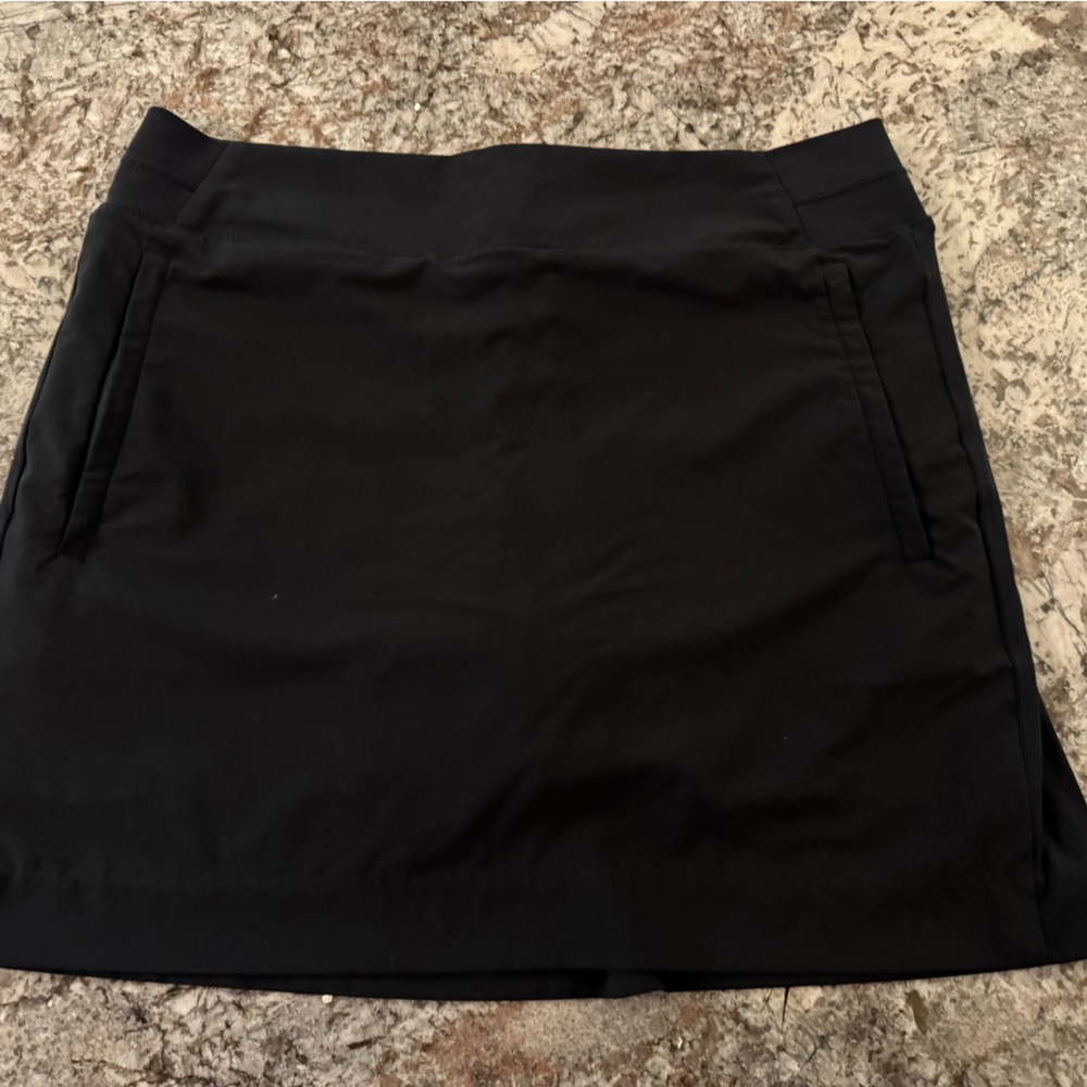 Athleta Black Skort with side Zip Pockets.  Size 12